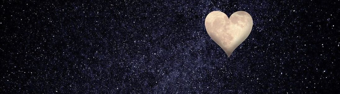 An illustration of a dark night sky, with a bright heart-shaped moon